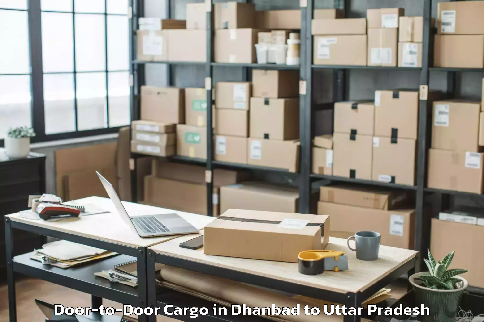 Leading Dhanbad to Pihani Door To Door Cargo Provider